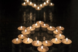Lit tealights in the shape of a Star of David 