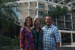 Luise Burger, Jan Marion, and Raymond Capelouto in front of the Orlando World Center Marriott 