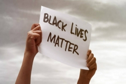 Protest sign that reads BLACK LIVES MATTER