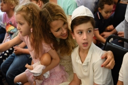 Mother and two children at Chofshi B'Manhattan event at Stephen Wise Free Synagogue in New York, NY