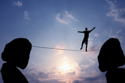 a man on a tightrope