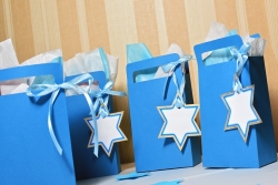 blue gift bags with star of David tags