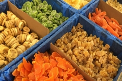 Bins of colorful dried fruit -- mango, banana, kiwi, pineapple -- in Jerusalem supermarket