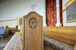 Star of David on a pew bench