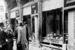 Black and white images of broken glass in a storefront after Kristallnacht