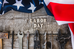 Tools and American flag with the words Labor Day
