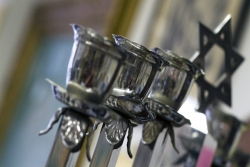 Close-up of sterling silver menorah with Star of David