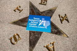 RAC-TX sign in the middle of a star