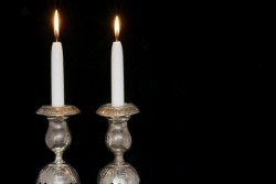 Shabbat candles in silver candlesticks