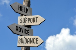 Sign-post with these signs: help, support, advice, guidance