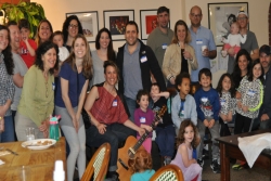Parents and children at a community Tot Shabbat program