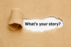 Butcher paper that reveals words through a tear: What's your story?
