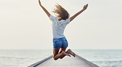 Girl jumps with exhilaration