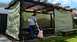 Mother and child in a sukkah