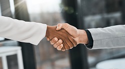 two people shaking hands