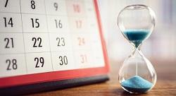 an hourglass and a calendar