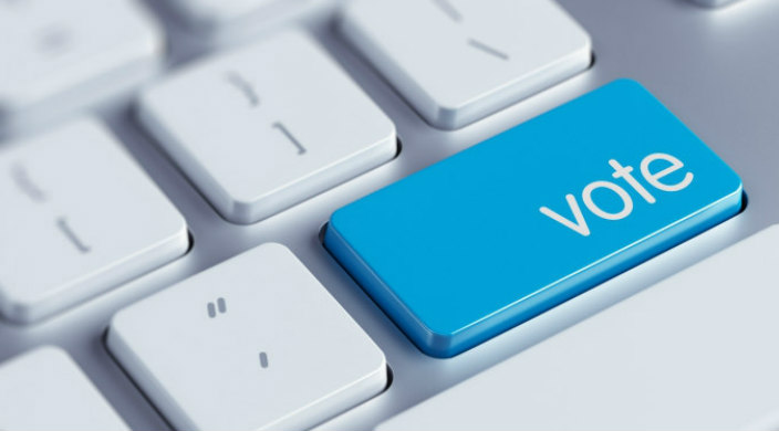 White keyboard buttons with one blue button reading VOTE